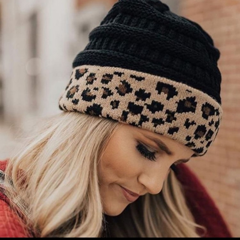 Warm and cozy C.C. black with leopard print winter beanie hat.
